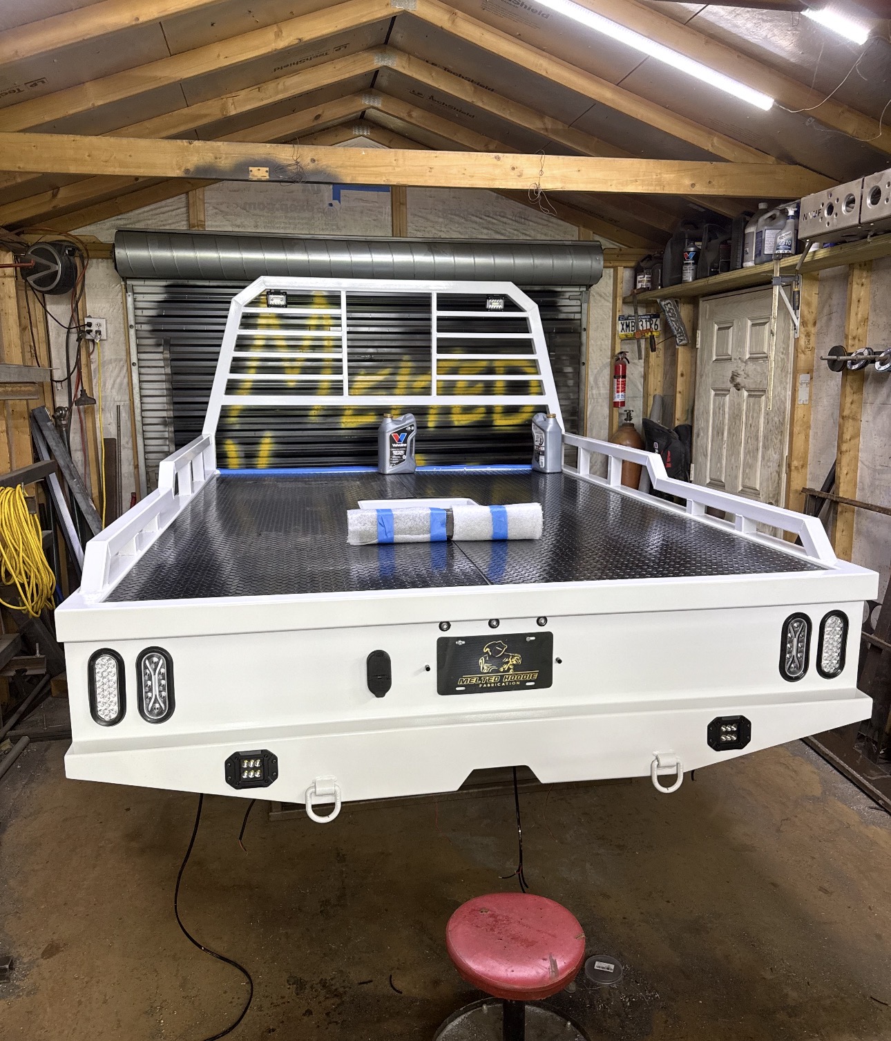 Custom flatbed lighting installation underway with recessed LED work lights