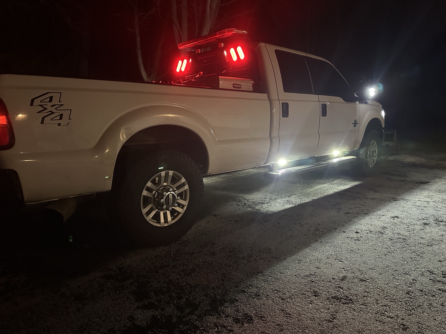 Ford F-350 showing custom work lighting at night